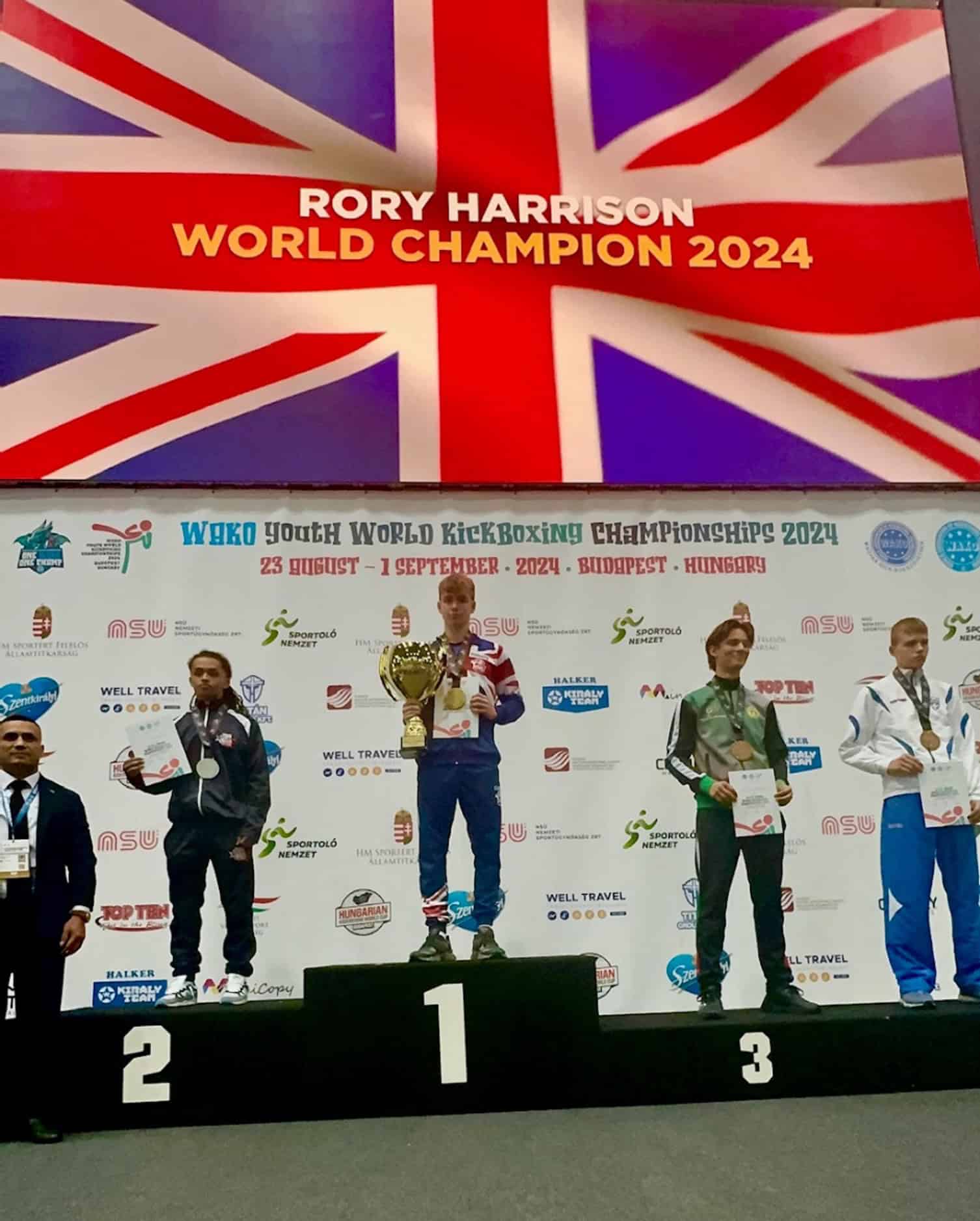 Cheadle Hulme Sixth Form and Elite pathway student Rory stands on the podium as he is crowned the Junior Men’s Kickboxing World Champion.